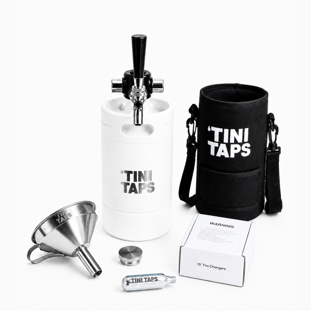 Tini Taps portable mini keg starter kit on a white background, including a white keg with tap handle, black cooler sleeve with white TINI TAPS text, stainless steel funnel, metal lid, CO2 cylinder, and white product box.