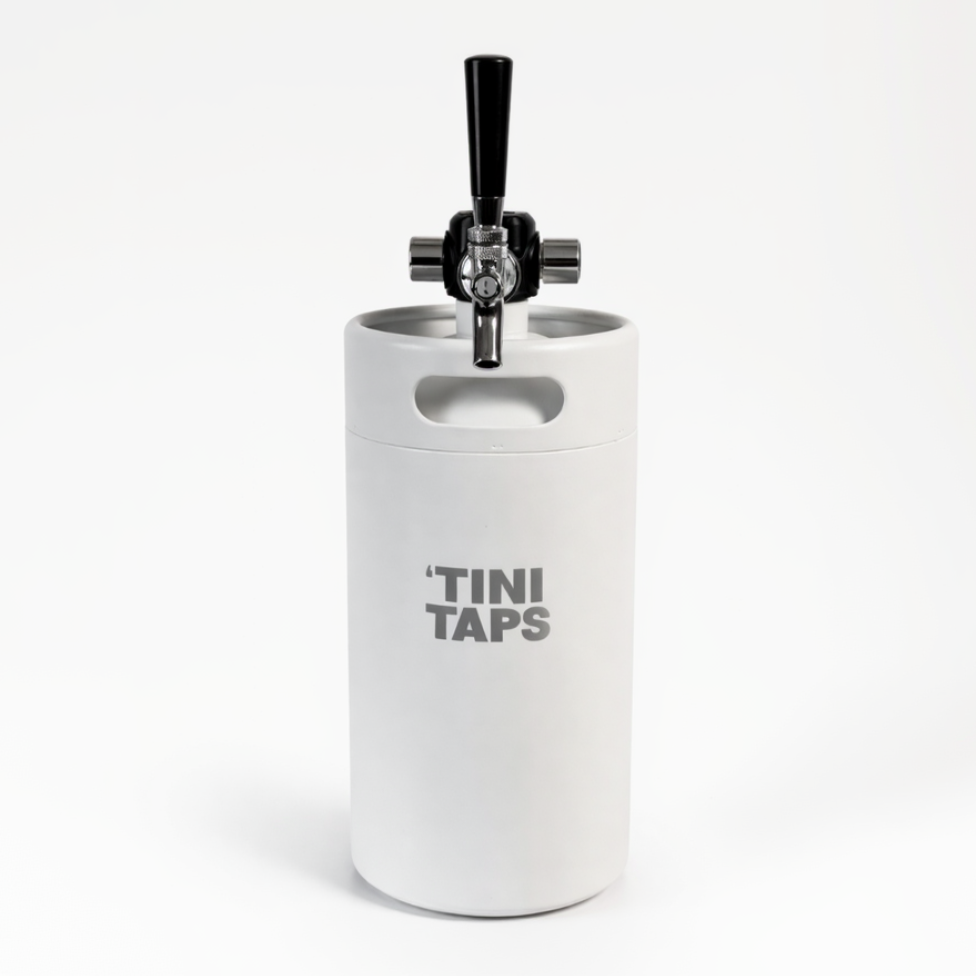 White 'Tini Taps keg with black tap handle on a white background.