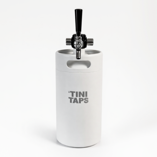 White 'Tini Taps keg with black tap handle on a white background.