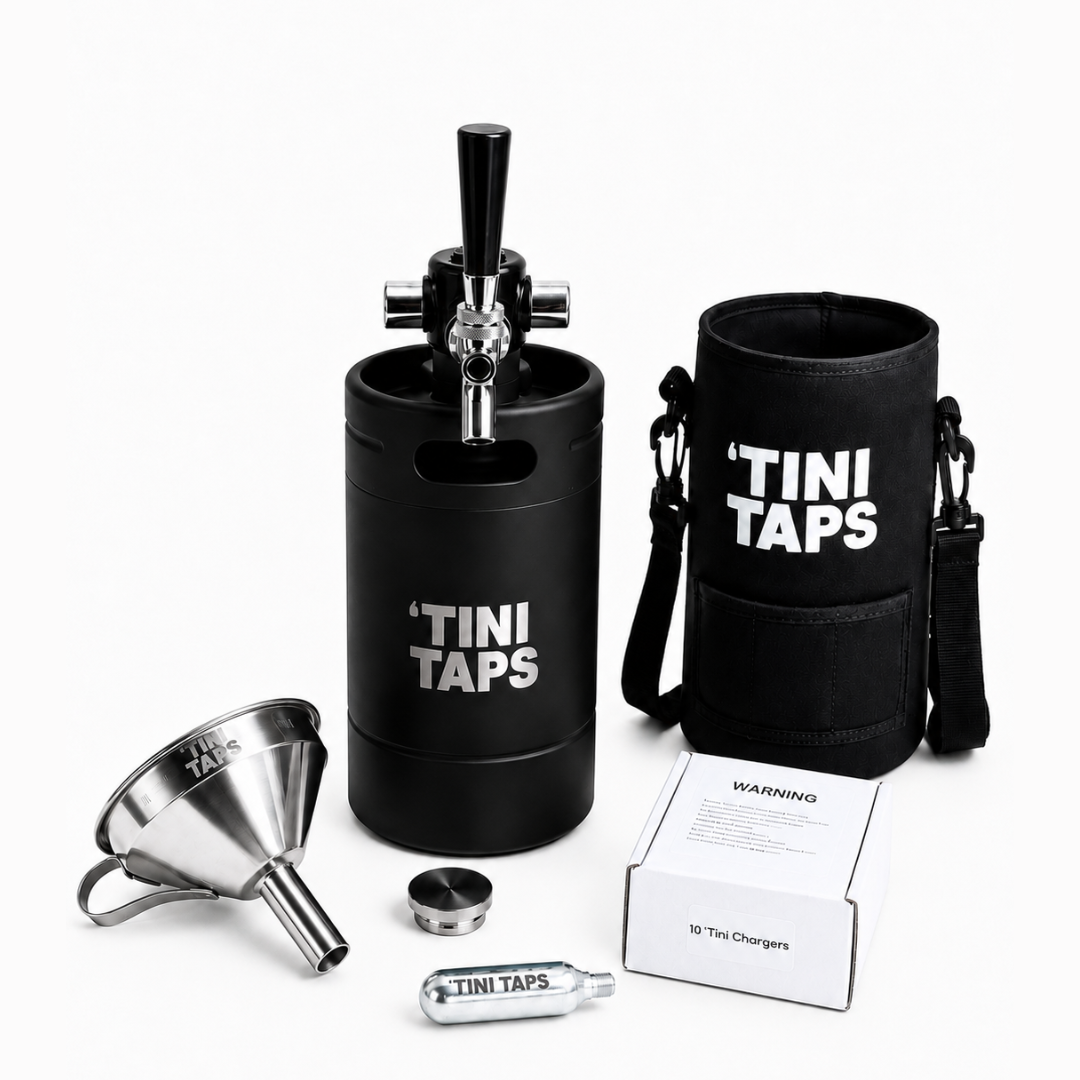 Tini Taps portable mini keg starter kit on a white background, including a black keg with tap handle, black cooler sleeve with white TINI TAPS text, stainless steel funnel, metal lid, CO2 cylinder, and white product box.