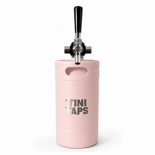 pink mini keg with tap handle and tini taps logo on white background.