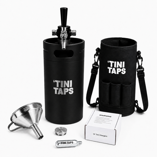 XL Tini Taps starter kit on a white background, including a black insulated mini keg with black tap handle, black carrying bag, stainless steep funnel, travel lid, CO2 cylinder, and product box.